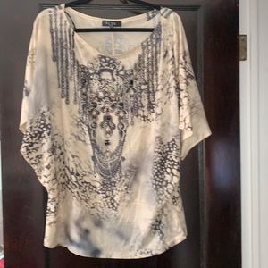 B.L.E.U woman tan grey black top